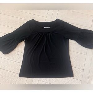 Chicos basic black top w/ bubble sleeves. Size 1/M. poly/spandex blend‎